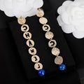 18K Chanel Script Pendant Earrings