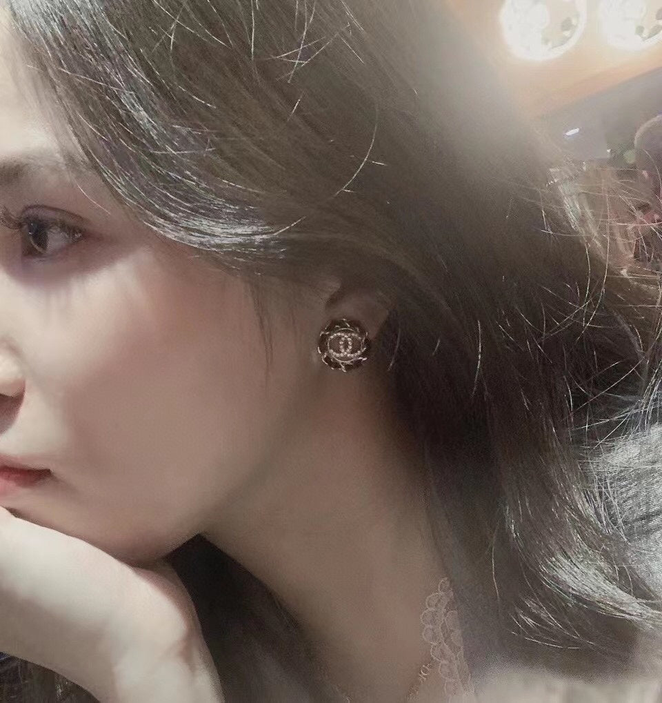 18K Chanel Black Leather Earrings