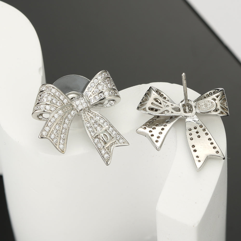 18K Chanel Bow Tie Diamond Earrings