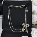 18K Chanel 25K Bow Tie Diamond Gold Necklace