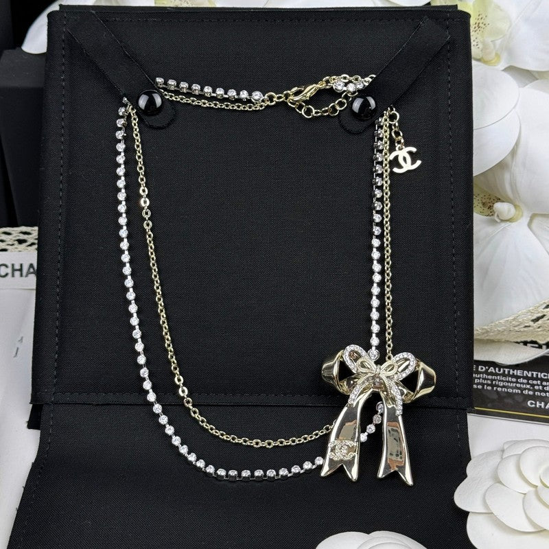18K Chanel 25K Bow Tie Diamond Gold Necklace