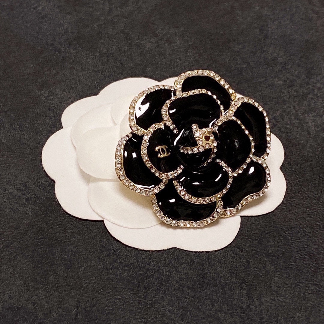 18K Chanel Black Flower Brooch