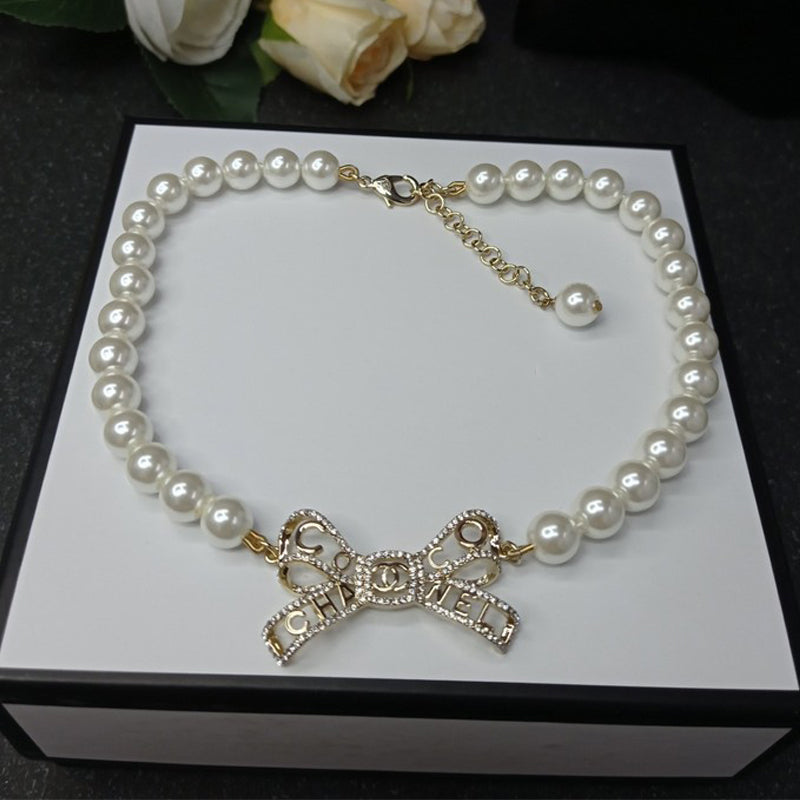18K Chanel Bow Pearl Necklace