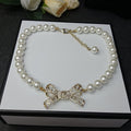 18K Chanel Bow Pearl Necklace