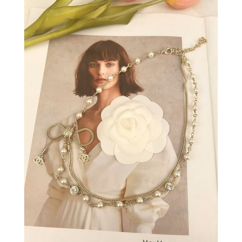 18K Chanel Bow Tie Pearl Necklace