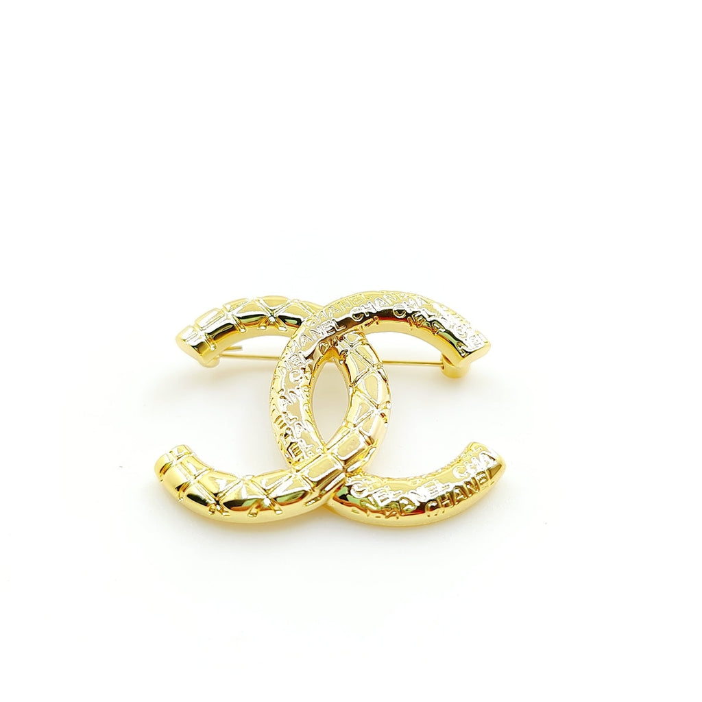 18K Chanel 24S Brooch