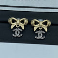 18K Chanel Bow Tie Gold Earrings