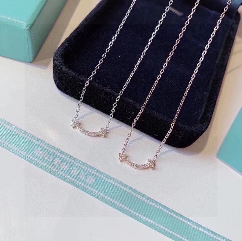 18K Tiffany & Co. Small Diamond Pendant Necklace