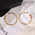 18K Saint Laurent YSL Circle Gold Earrings