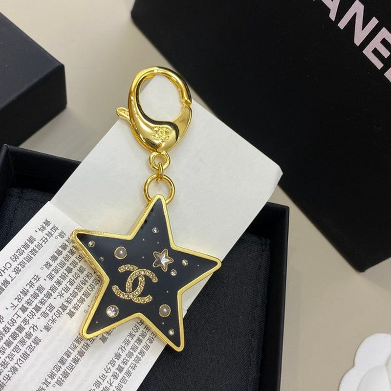 18K Chanel Black Gold Star Brooch