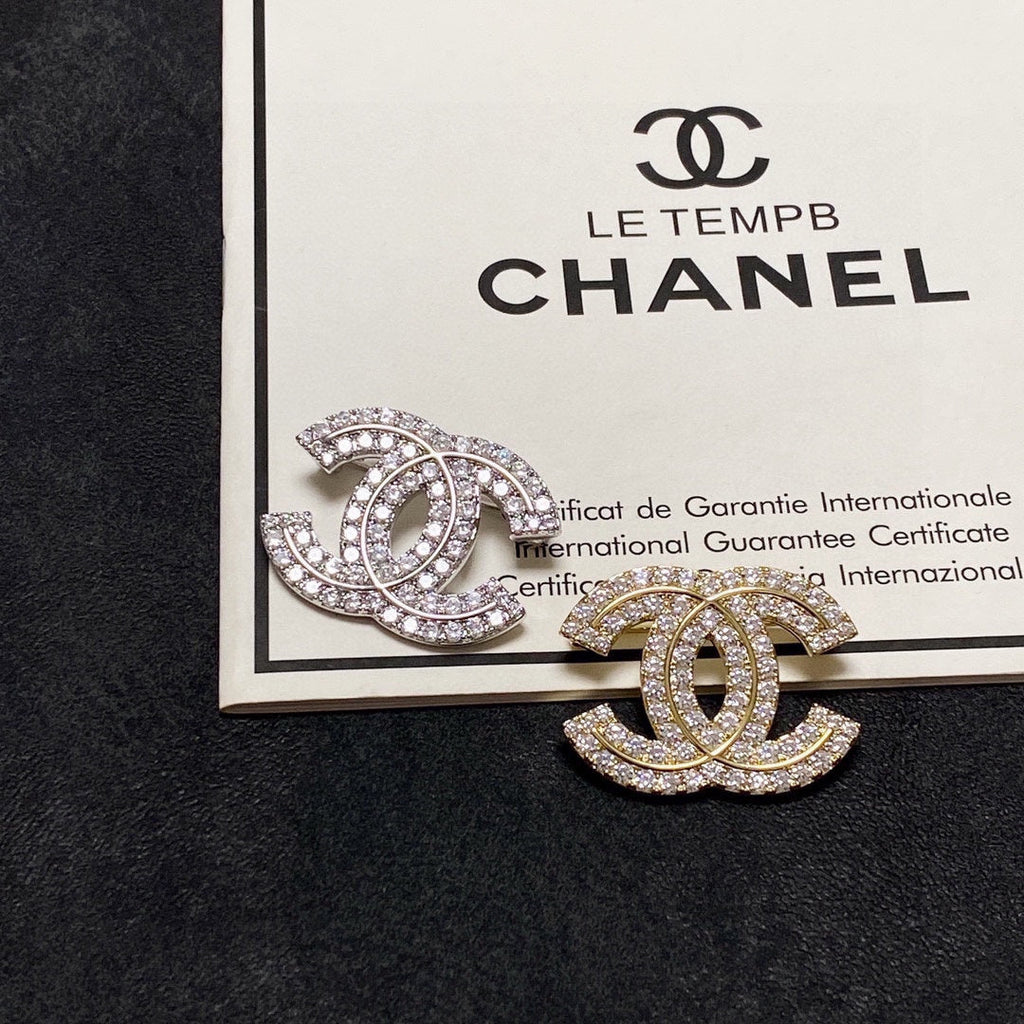 18K Chanel Diamonds Set Broochs