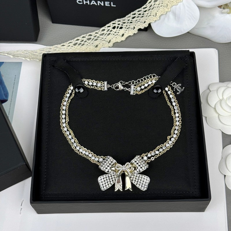 18K Chanel 25K Bow Tie Choker Necklace