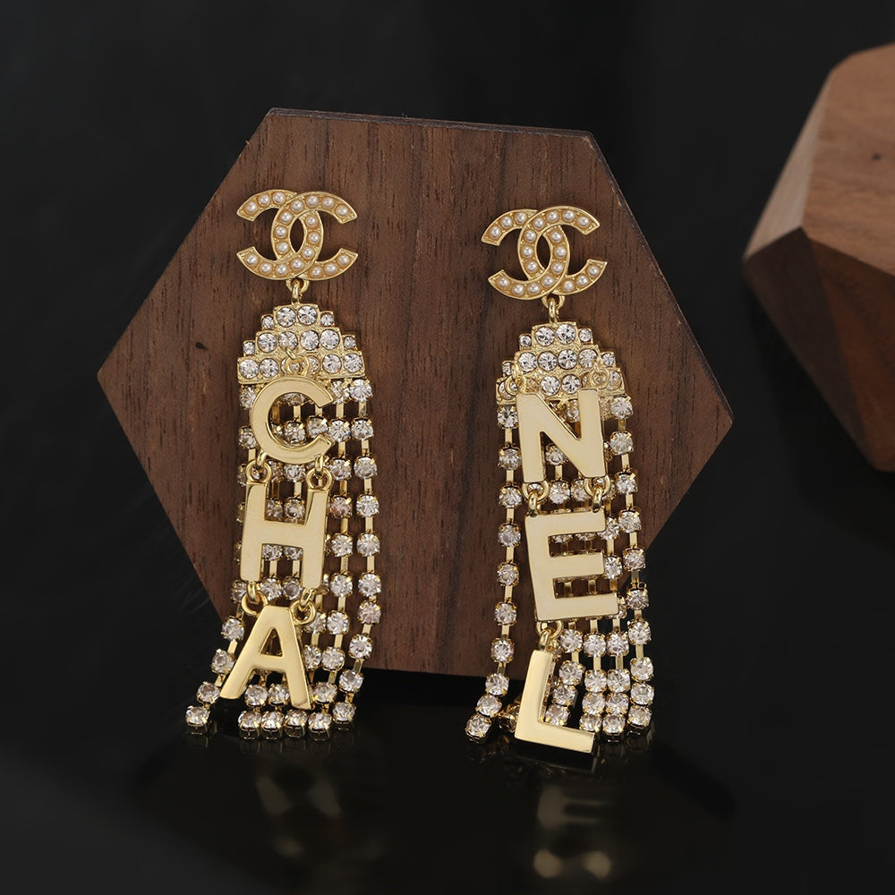 18K Chanel Letter Earrings