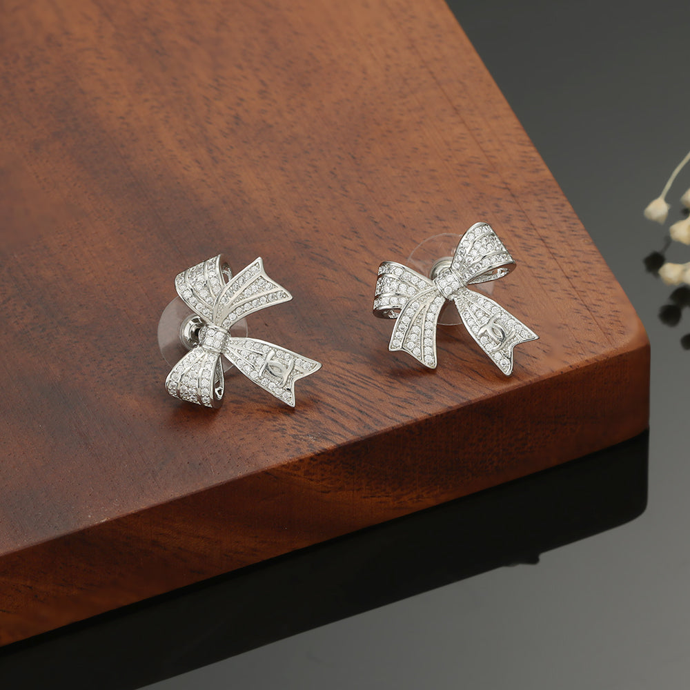 18K Chanel Bow Tie Diamond Earrings