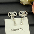 18K Chanel Butterfly Pearl Earrings
