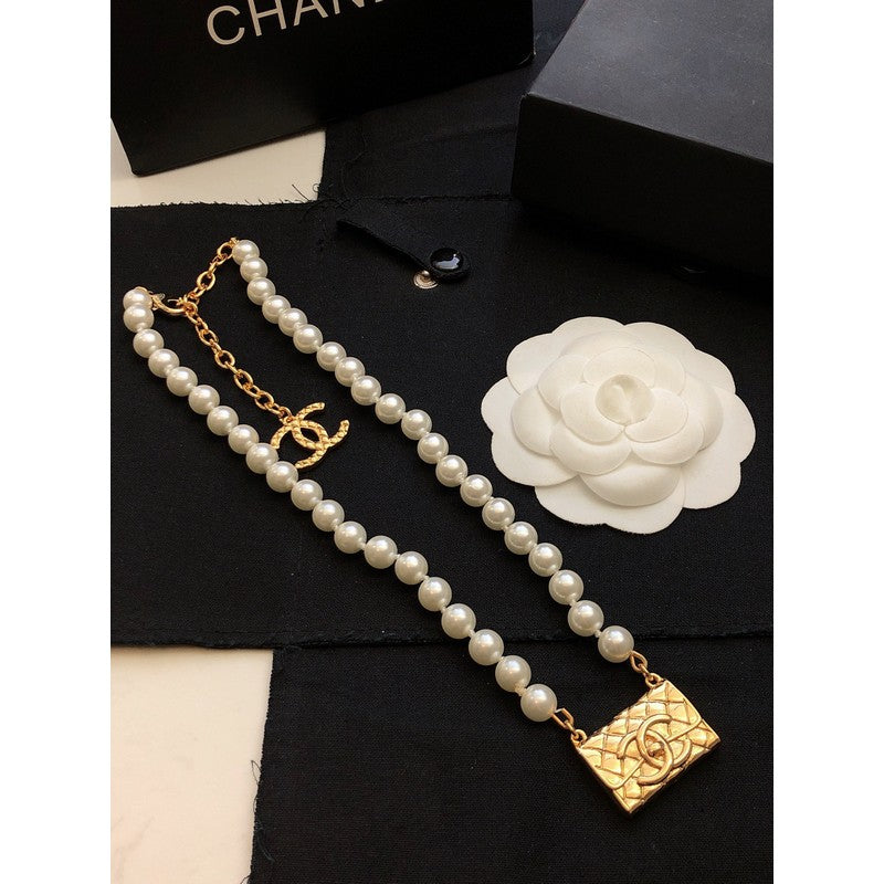 18K Chanel Pearl Bag Pendant Necklace