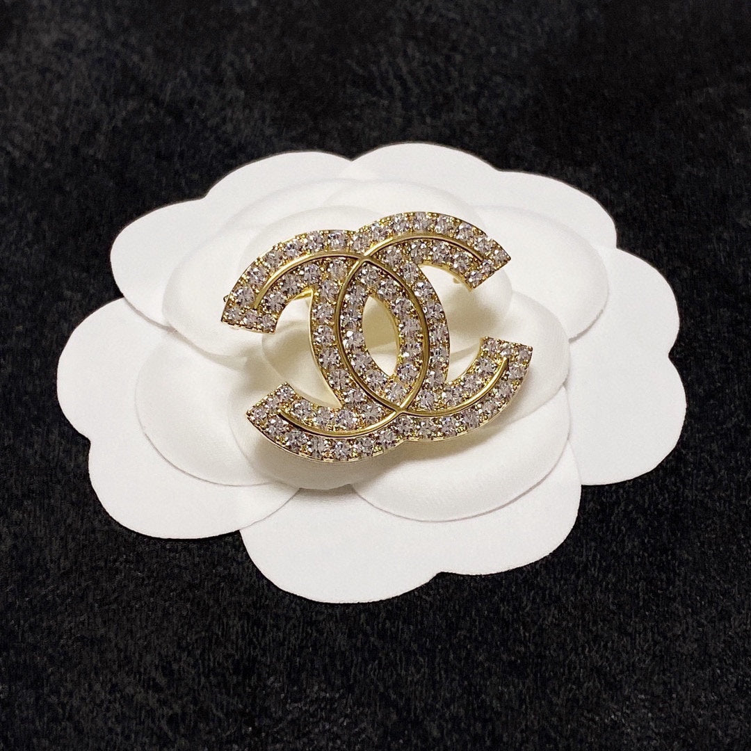 18K Chanel Diamonds Set Broochs