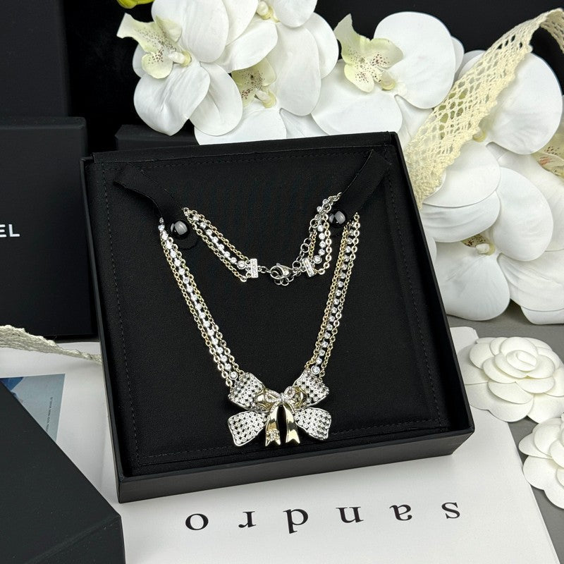 18K Chanel 25K Bow Tie Choker Necklace