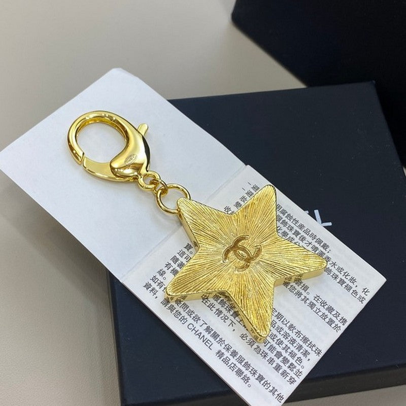 18K Chanel Black Gold Star Brooch