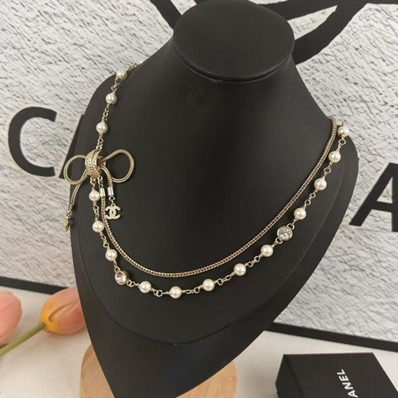 18K Chanel Bow Tie Pearl Necklace