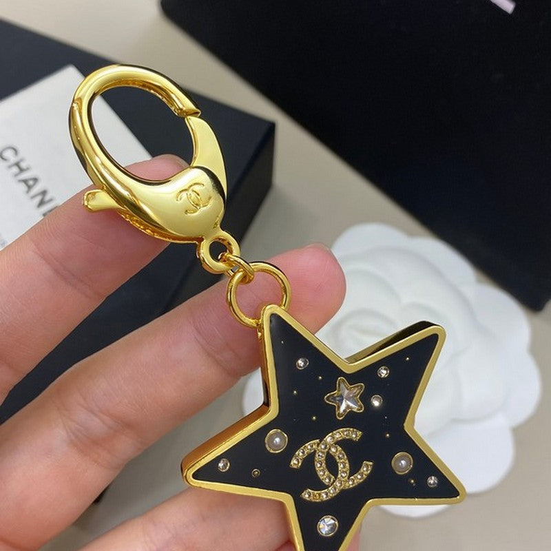 18K Chanel Black Gold Star Brooch