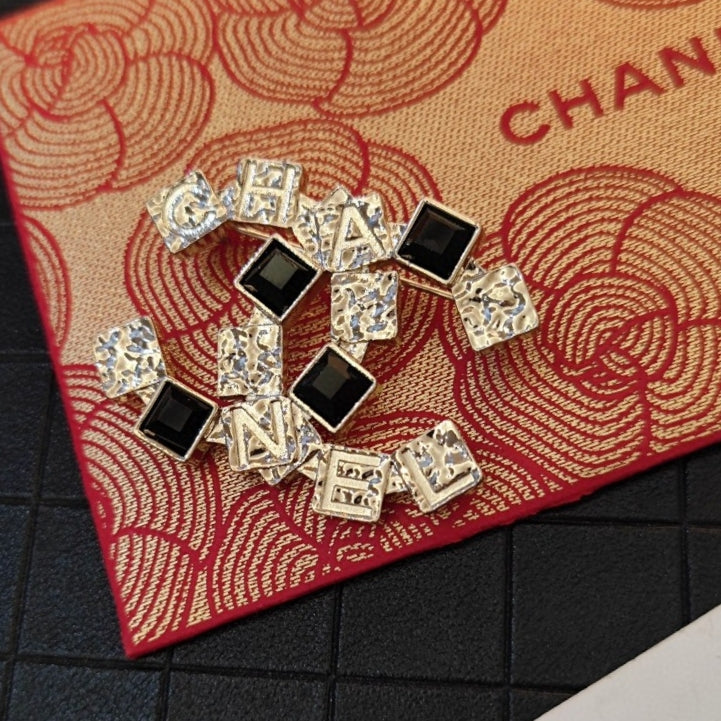 18K Chanel Black Crystals Brooch