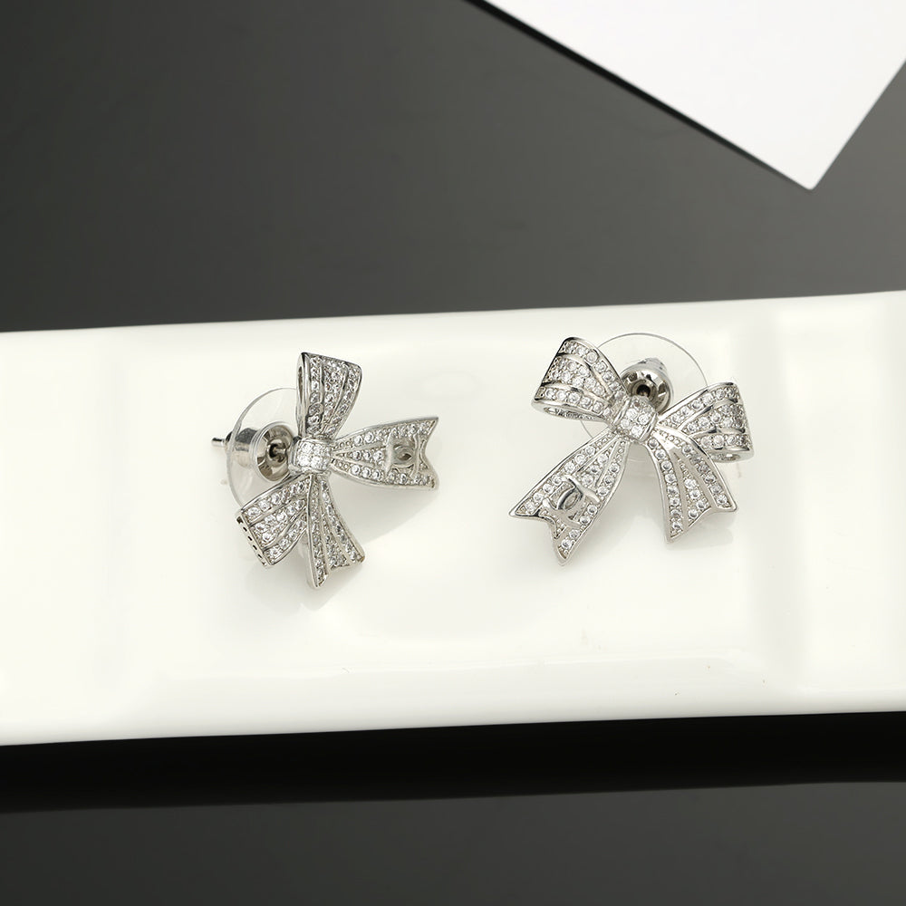18K Chanel Bow Tie Diamond Earrings