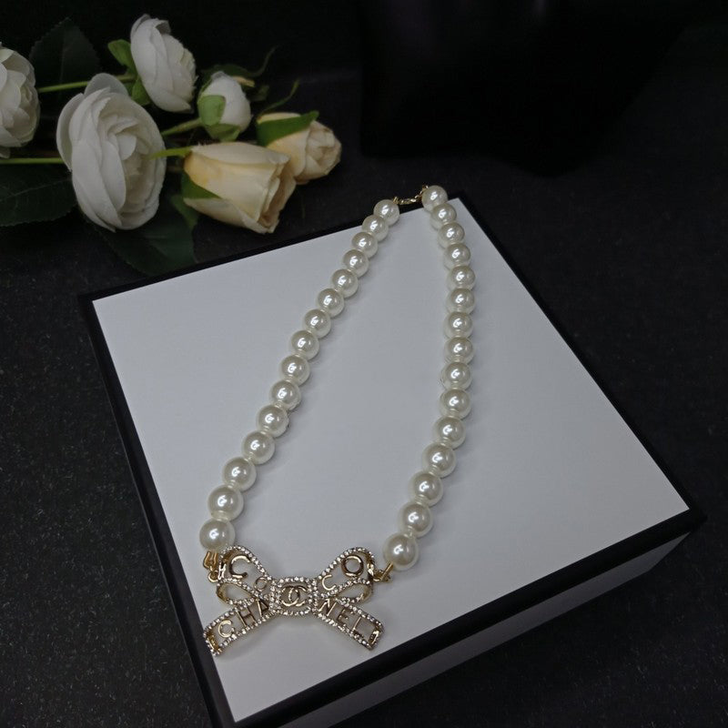 18K Chanel Bow Pearl Necklace