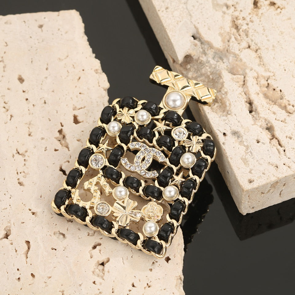 18K Chanel Bottle Strass Brooch