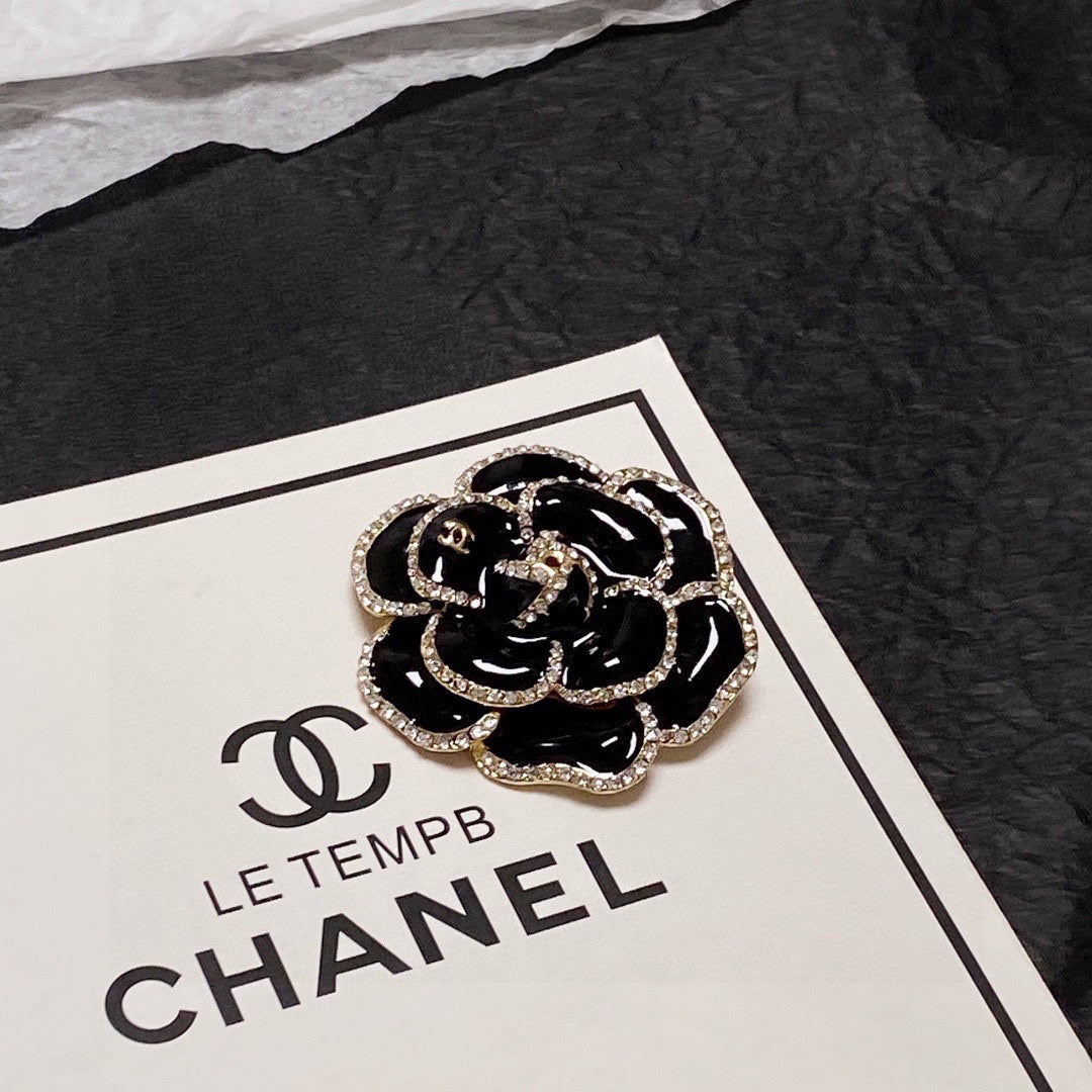 18K Chanel Black Flower Brooch