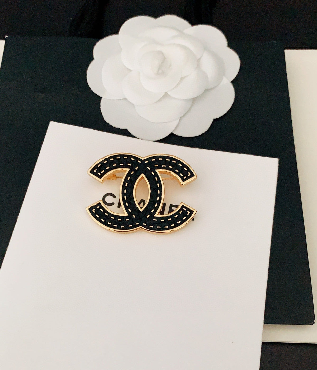18K Chanel Black Brooch