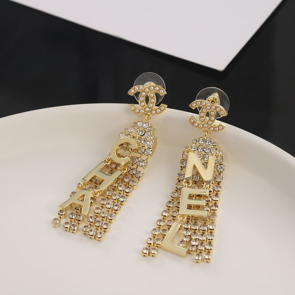 18K Chanel Letter Earrings