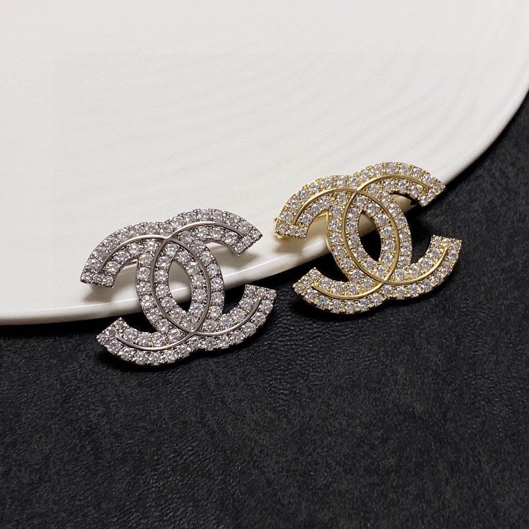 18K Chanel Diamonds Set Broochs