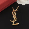 18K Saint Laurent YSL Gold Brooch