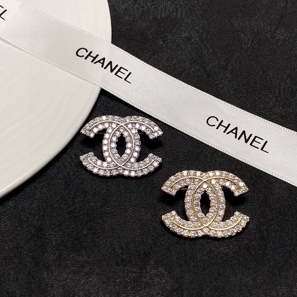 18K Chanel Diamonds Set Broochs