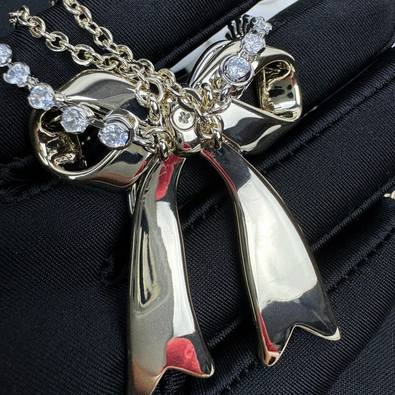 18K Chanel 25K Bow Tie Diamond Gold Necklace