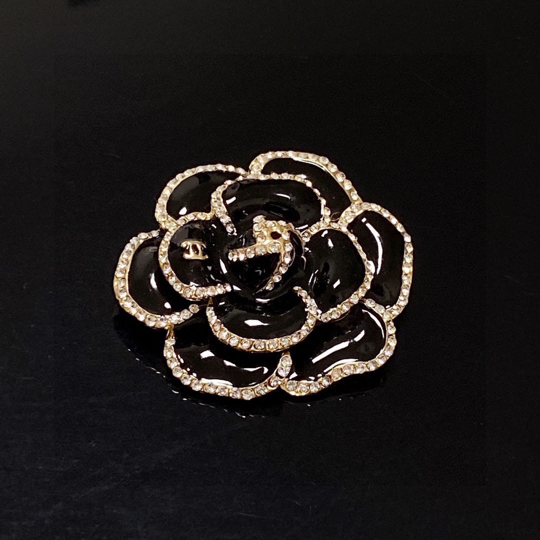 18K Chanel Black Flower Brooch