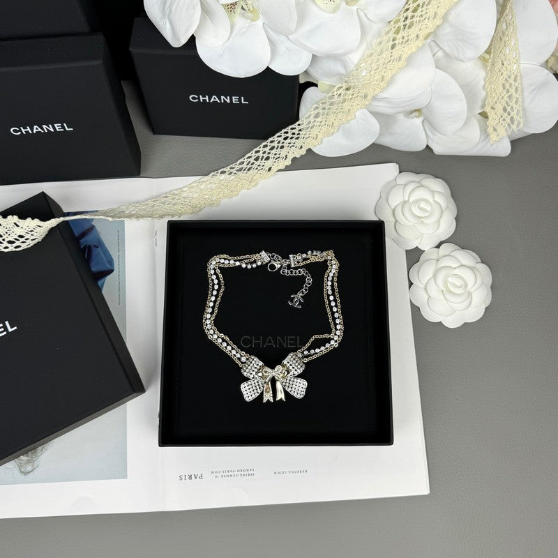 18K Chanel 25K Bow Tie Choker Necklace