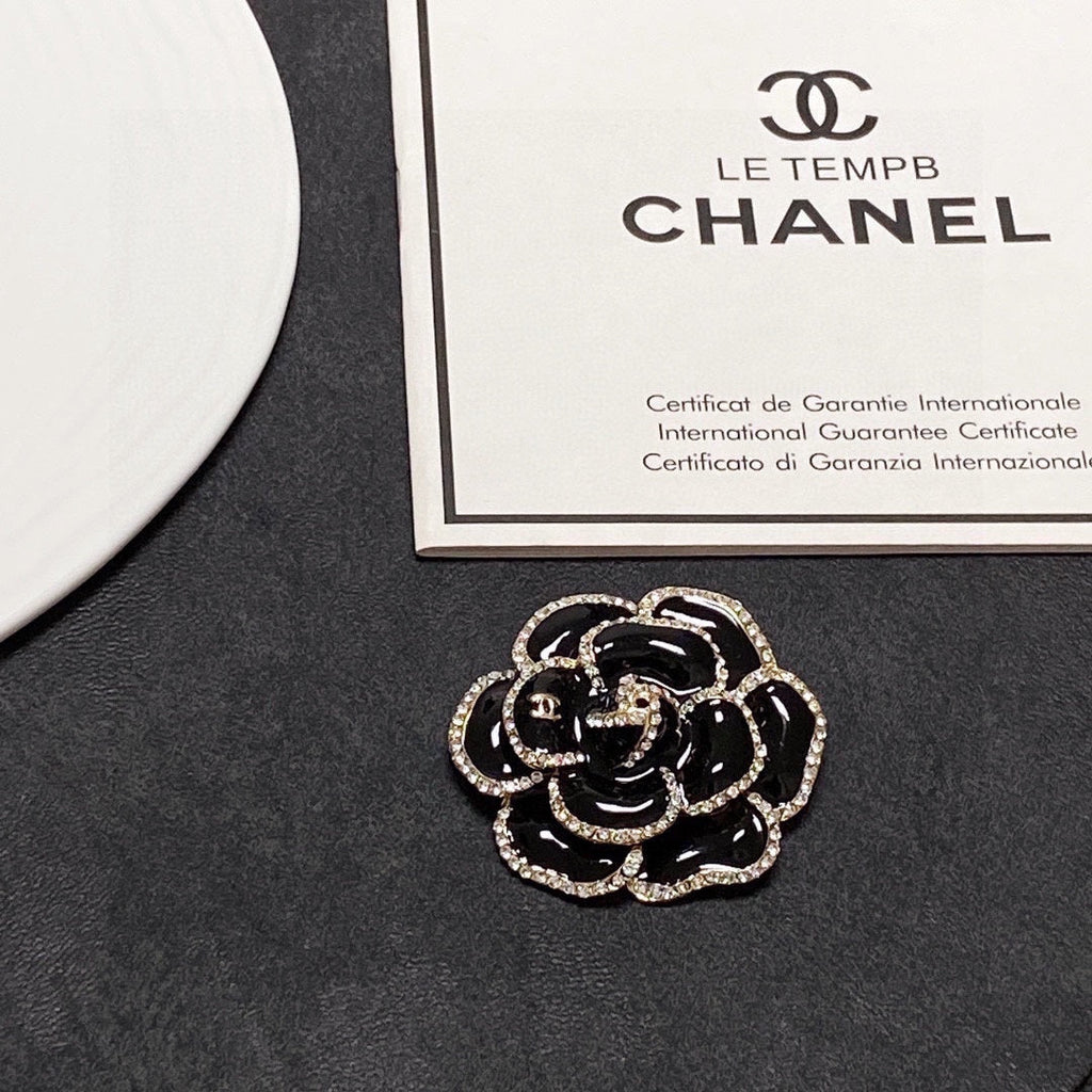 18K Chanel Black Flower Brooch